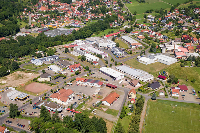 Drohnenflugansicht: Gewerbegebiet Auewiesen Floh-Seligenthal